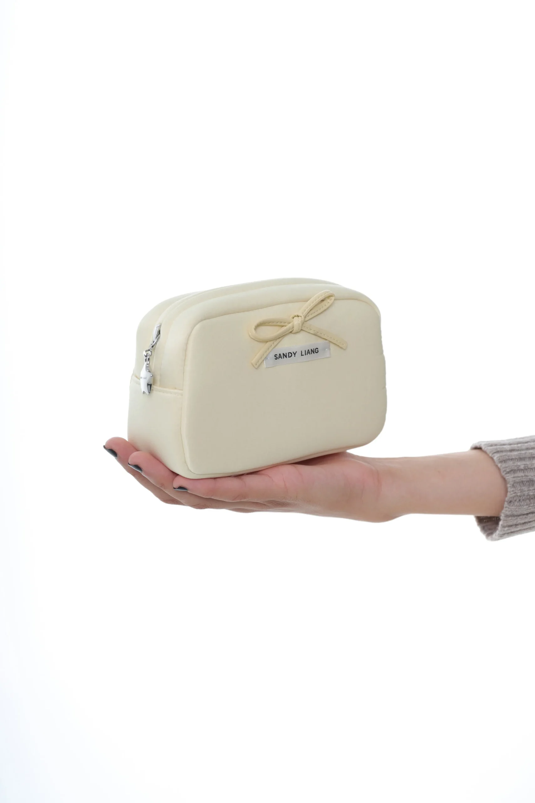 smol_pouch_in_butter_2.webp SANDY LIANG SMOL POUCH IN BUTTER> Handheld | Pouches
